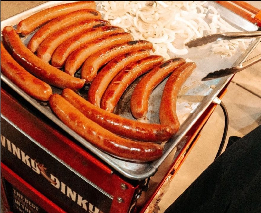 Links on the grill at the Winky Dinky Dogs cart